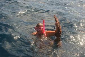 Susan collecting her pearls