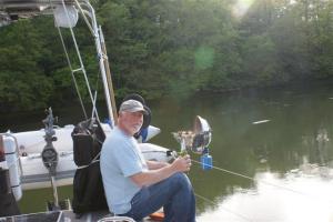 Bill enjoying a beer while barbecuing