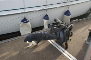 The dead outboard (not our boat in the background)
