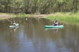 Daisy and Kate in the canoes
