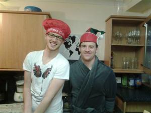 A Christmas cook and his little helper