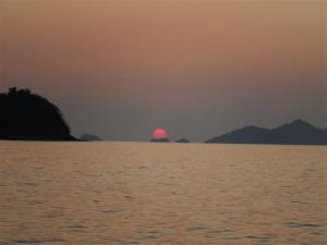 We watched the sun go behind the tiny island