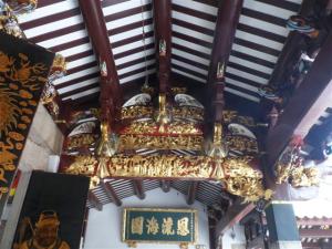 The beautiful carved ceiling