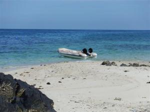 Our little dinghy took us to the island