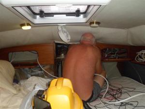 Bill working in the aft cabin with more wires