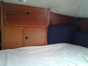 The cupboards back in place over our bed