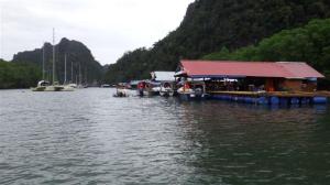 A row of floating restaurants