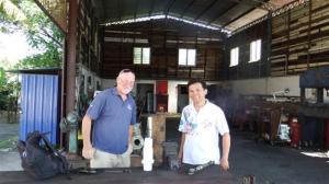 Bill with the young lad at the machine shop