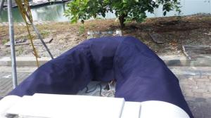A third of a dinghy cover