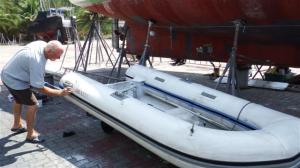 The dinghy with glued neoprene strips on