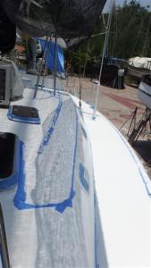 Newly painted decks with all the blue masking tape over everything