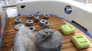 Weights holding planking in place