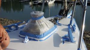 The anchor winch masked up on the bow