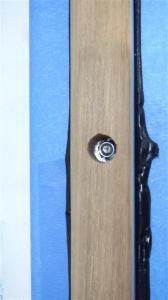 Looking down into the hole to see the nut in place