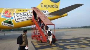 Bill boarding our bright yellow plane