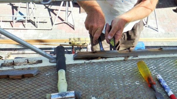 Removing the old toe rail 