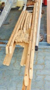 New set of grab handles alongside the new toe rails marked up ready to replace