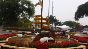 Roundabout with distance signpost