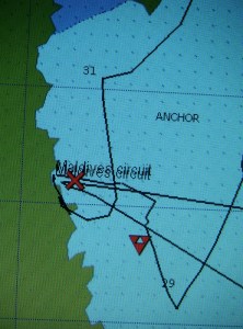 Our anchorage. Our position by the cross. The triangle is boat waypoint from last year 