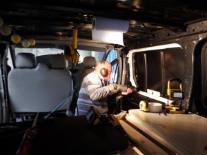 Bill cutting out the window